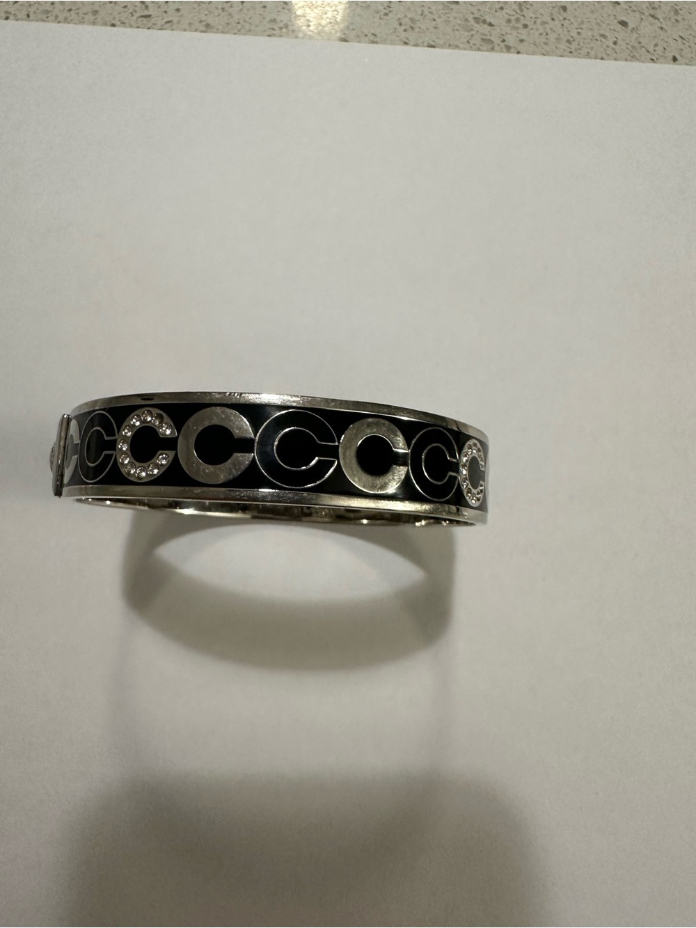 Coach Black Enamel and Silver Logo Bangle Bracelet with a few sparkle “C”’s - Picture 2 of 3